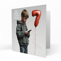 Personalised 7th Birthday Card - Boy Using a Phone with Number Balloon
