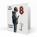 Personalised 8th Birthday Card - Boy Using a Phone with Number Balloon