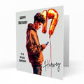 Personalised 17th Birthday Card - Boy Using a Phone with Number Balloon